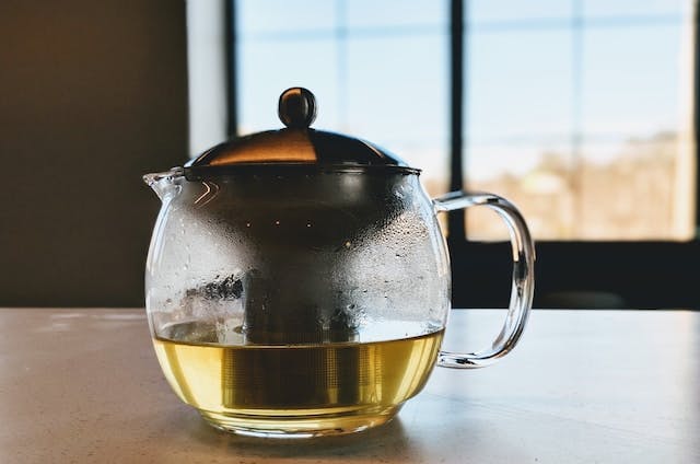 Filled clear glass kettle